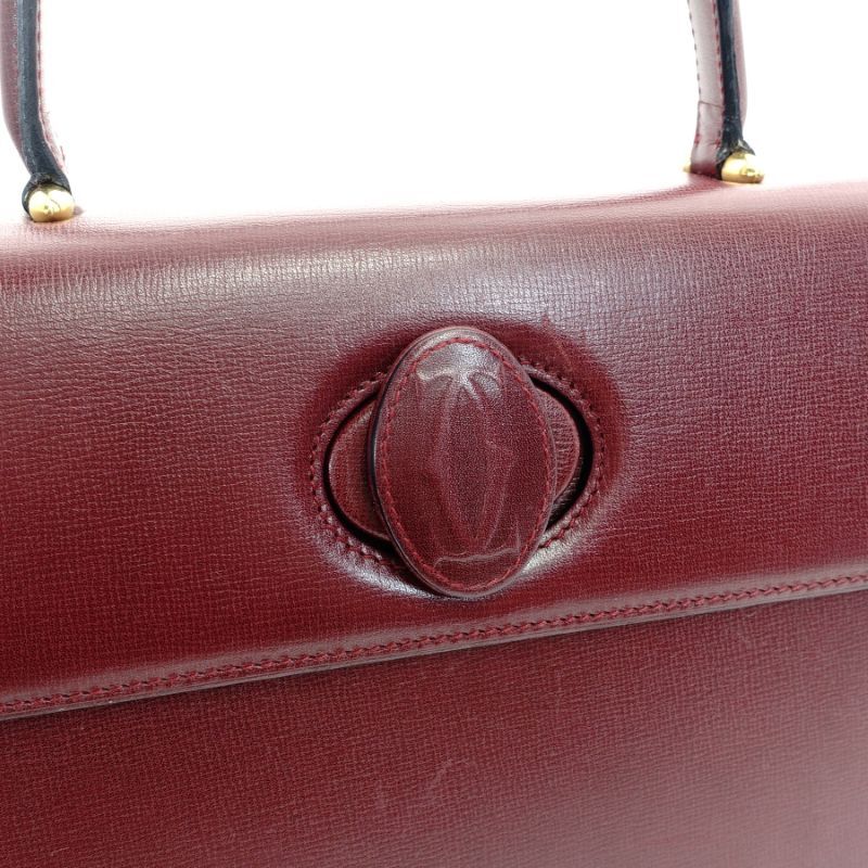 Cartier Mustline handbag leather Bordeaux vintage gold hardware