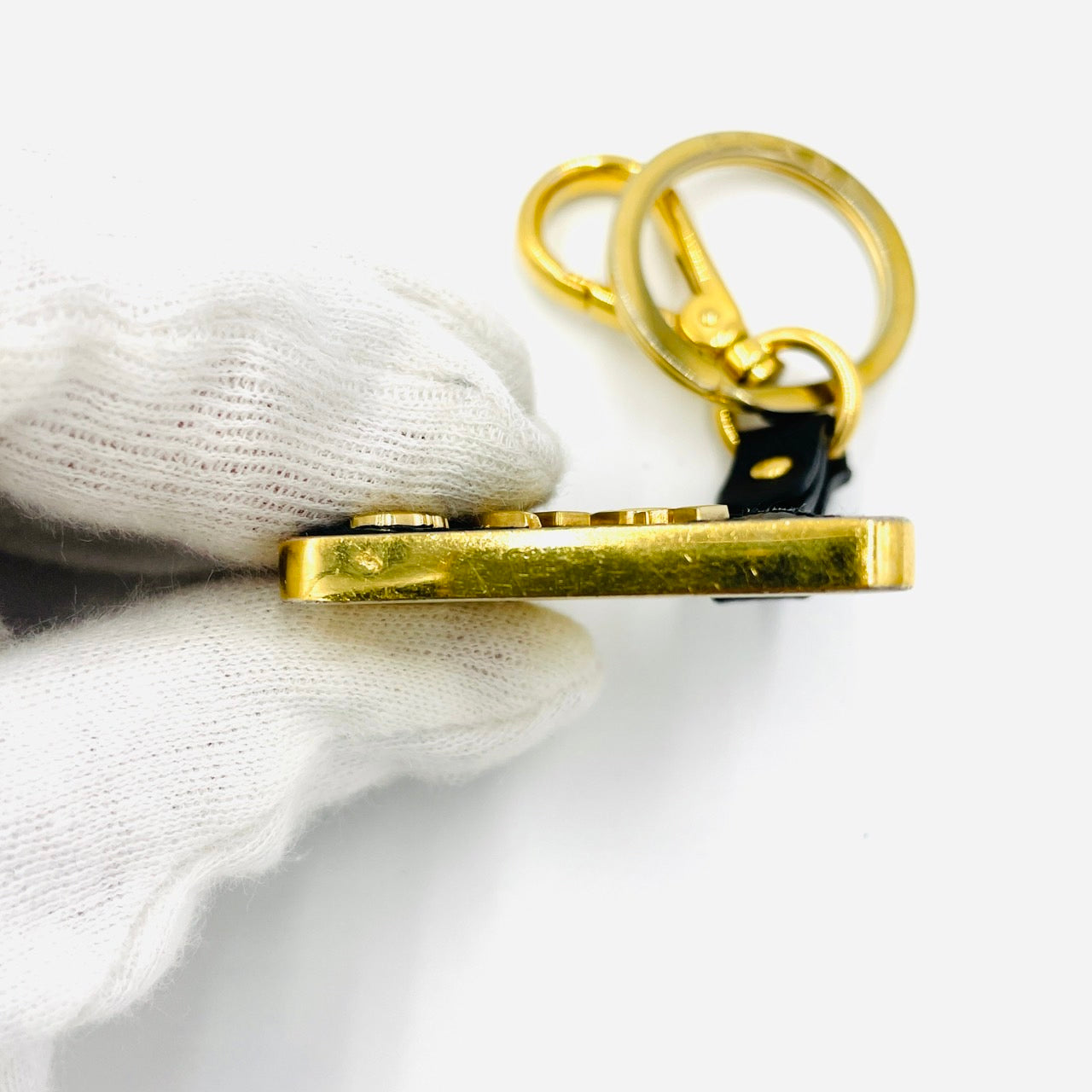 PRADA Key Charm Black Gold