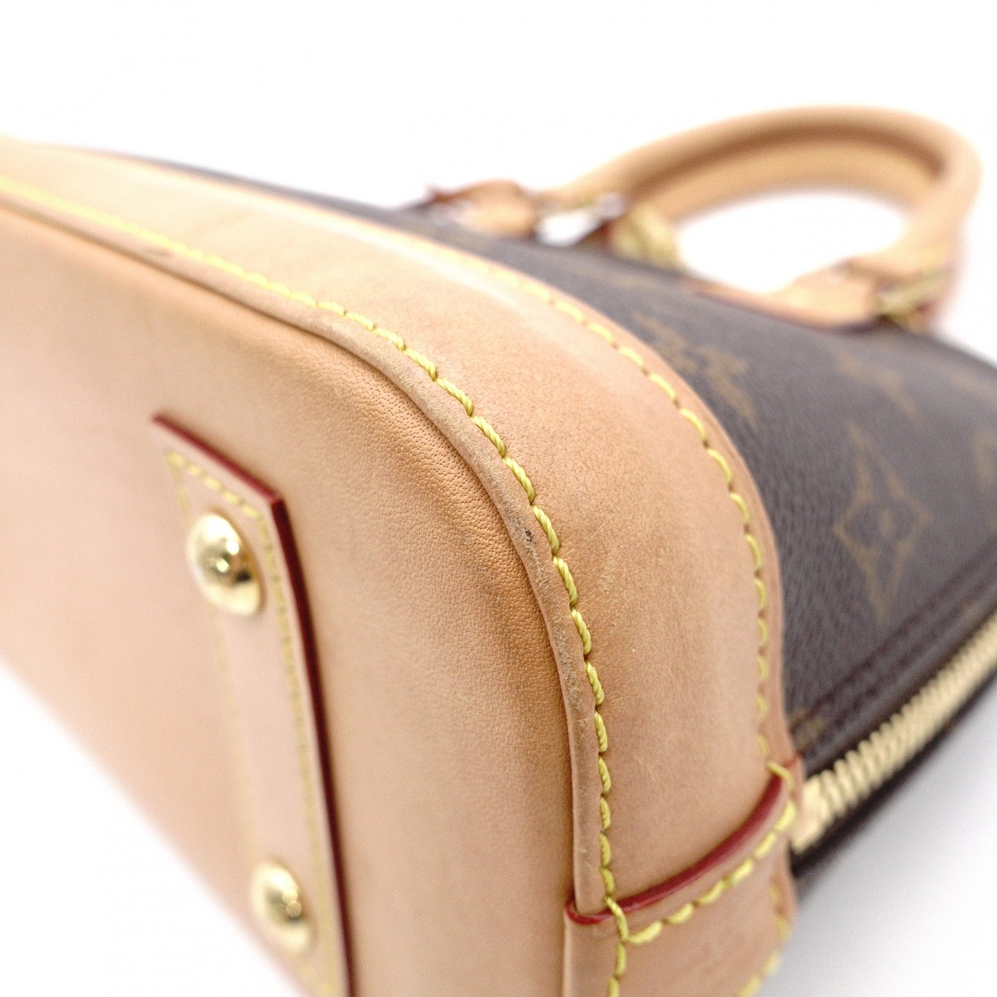 LOUIS VUITTON Alma BB Monogram Canvas Shoulder Bag with Leather and PVC Accents in Brown Tones (2-Way)