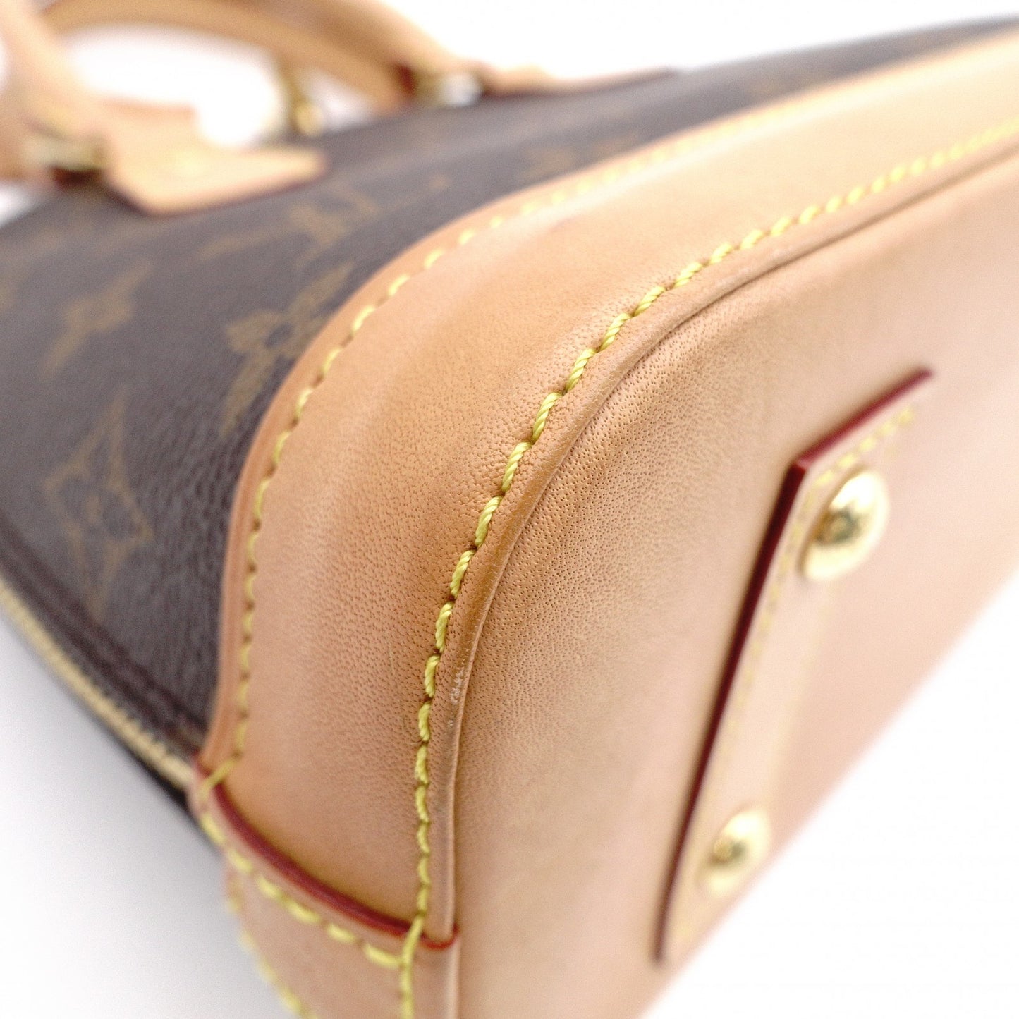 LOUIS VUITTON Alma BB Monogram Canvas Shoulder Bag with Leather and PVC Accents in Brown Tones (2-Way)