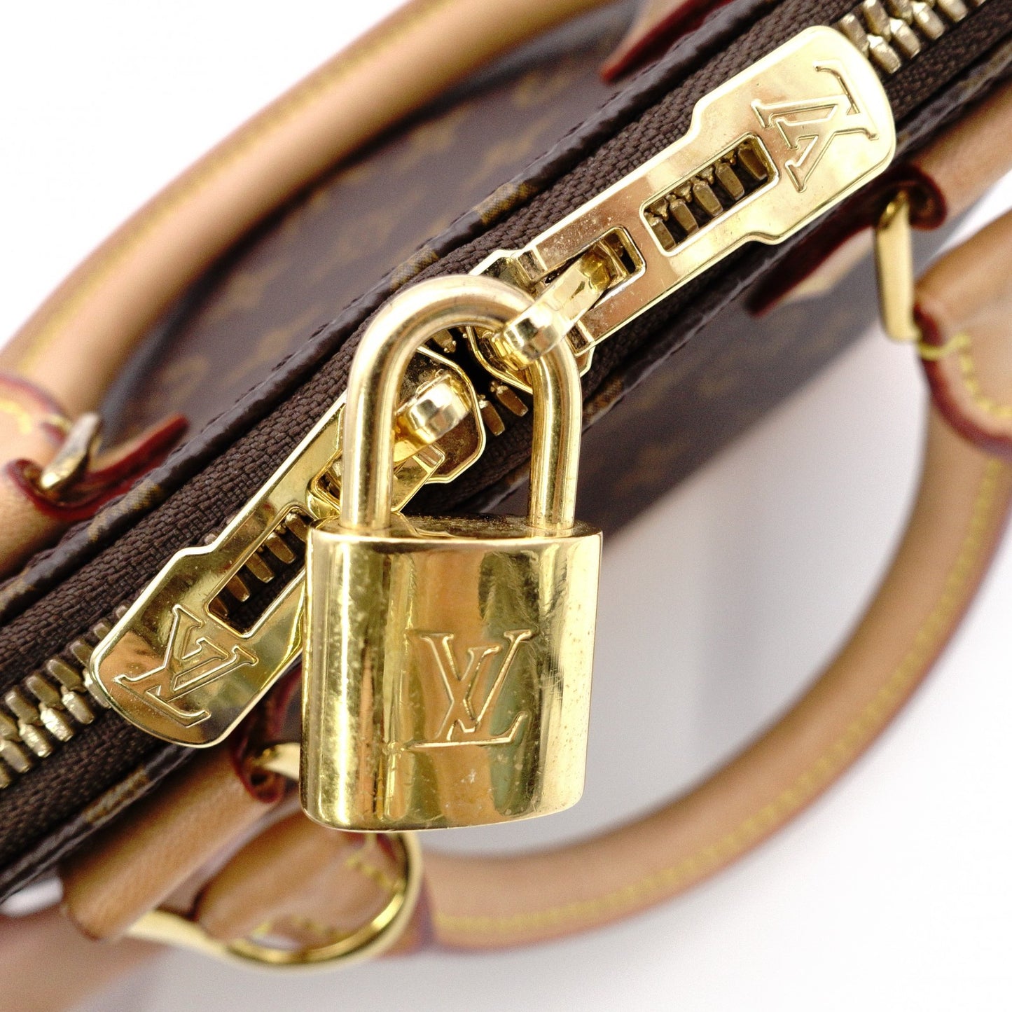LOUIS VUITTON Alma BB Monogram Canvas Shoulder Bag with Leather and PVC Accents in Brown Tones (2-Way)