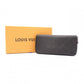 LOUIS VUITTON Zippy Vertical Damier Infini Long Wallet, Leather, Black