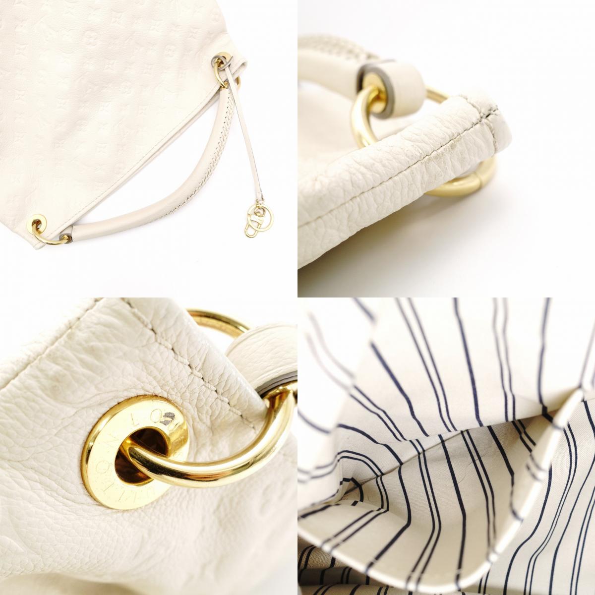 LOUIS VUITTON Artzy Monogram Empreinte Shoulder Bag, Leather, White