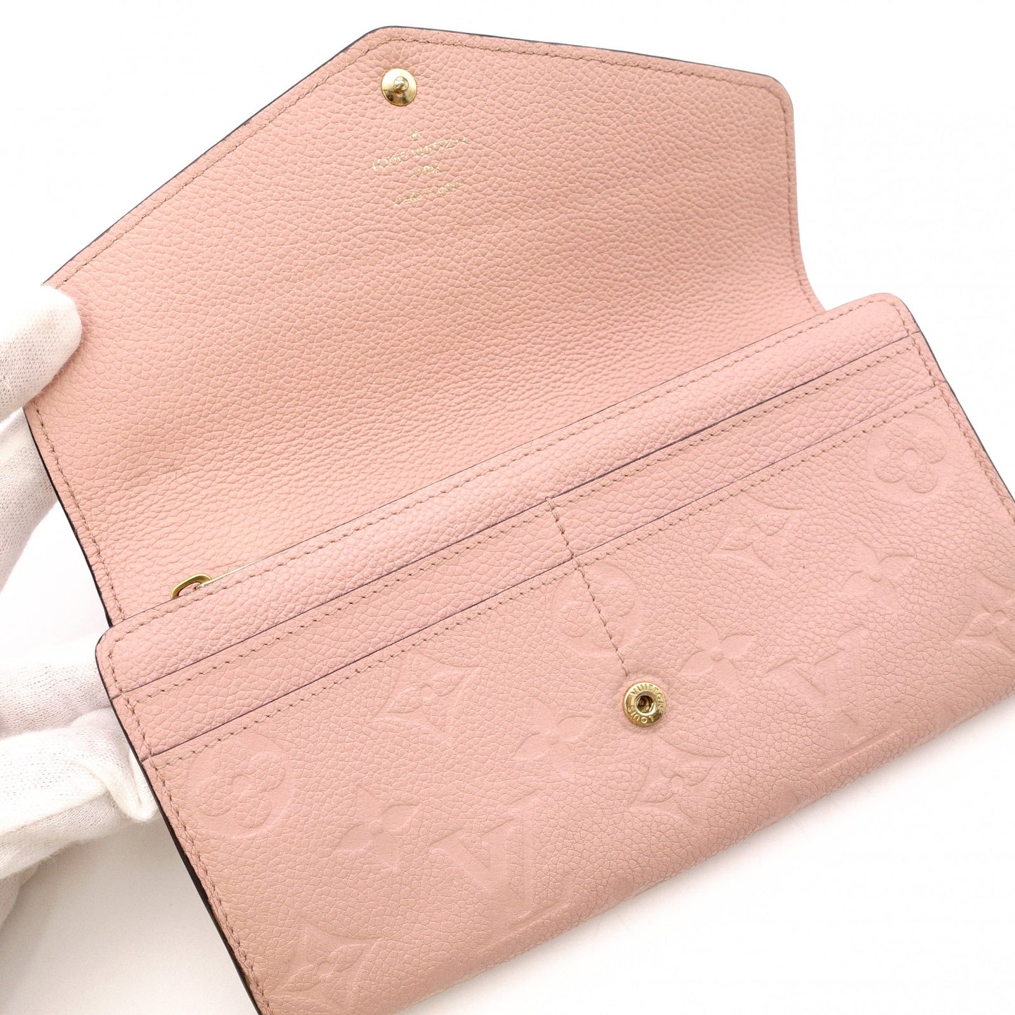 LOUIS VUITTON Monogram Empreinte Sara Wallet in Pink