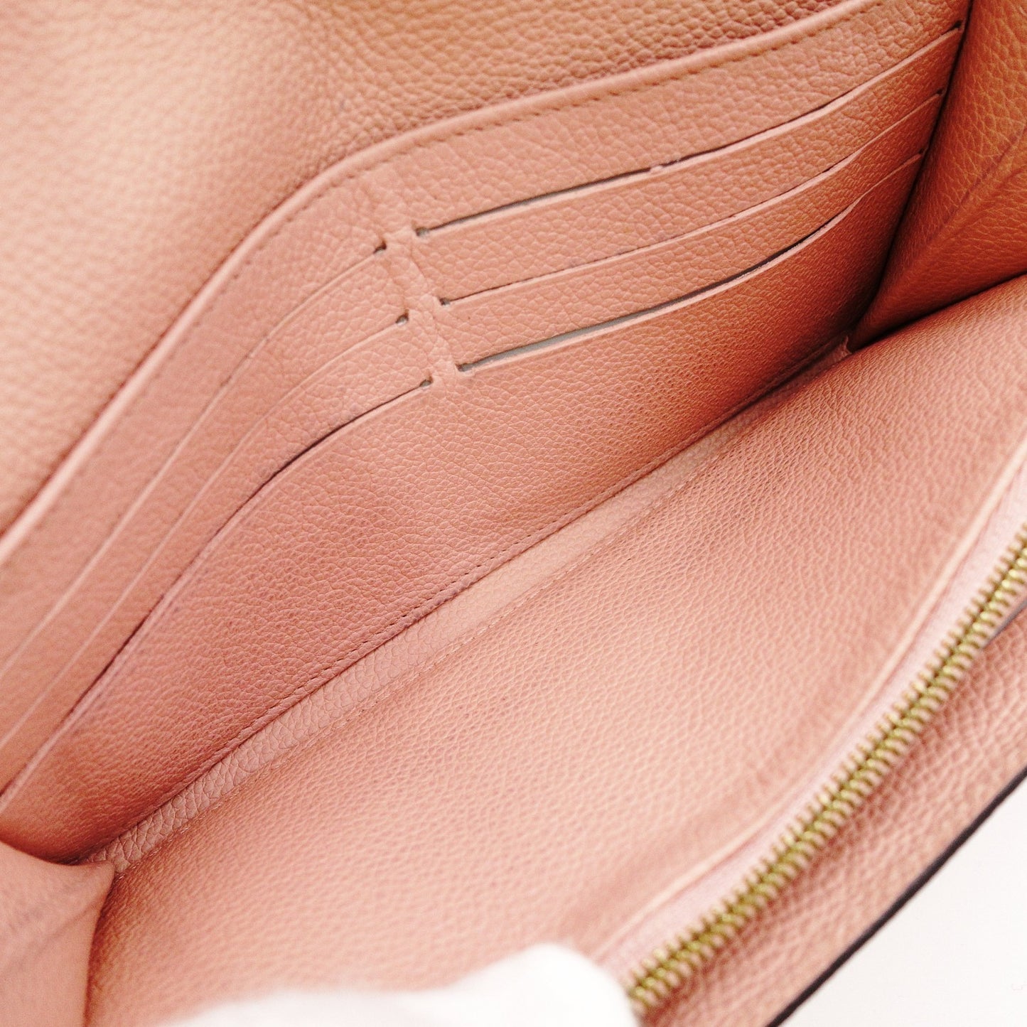 LOUIS VUITTON Monogram Empreinte Sara Wallet in Pink