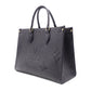 LOUIS VUITTON On the Go MM OTG Monogram Implant Handbag, Leather, Black, 2-Way