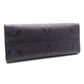 LOUIS VUITTON On the Go MM OTG Monogram Implant Handbag, Leather, Black, 2-Way