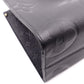 LOUIS VUITTON On the Go MM OTG Monogram Implant Handbag, Leather, Black, 2-Way