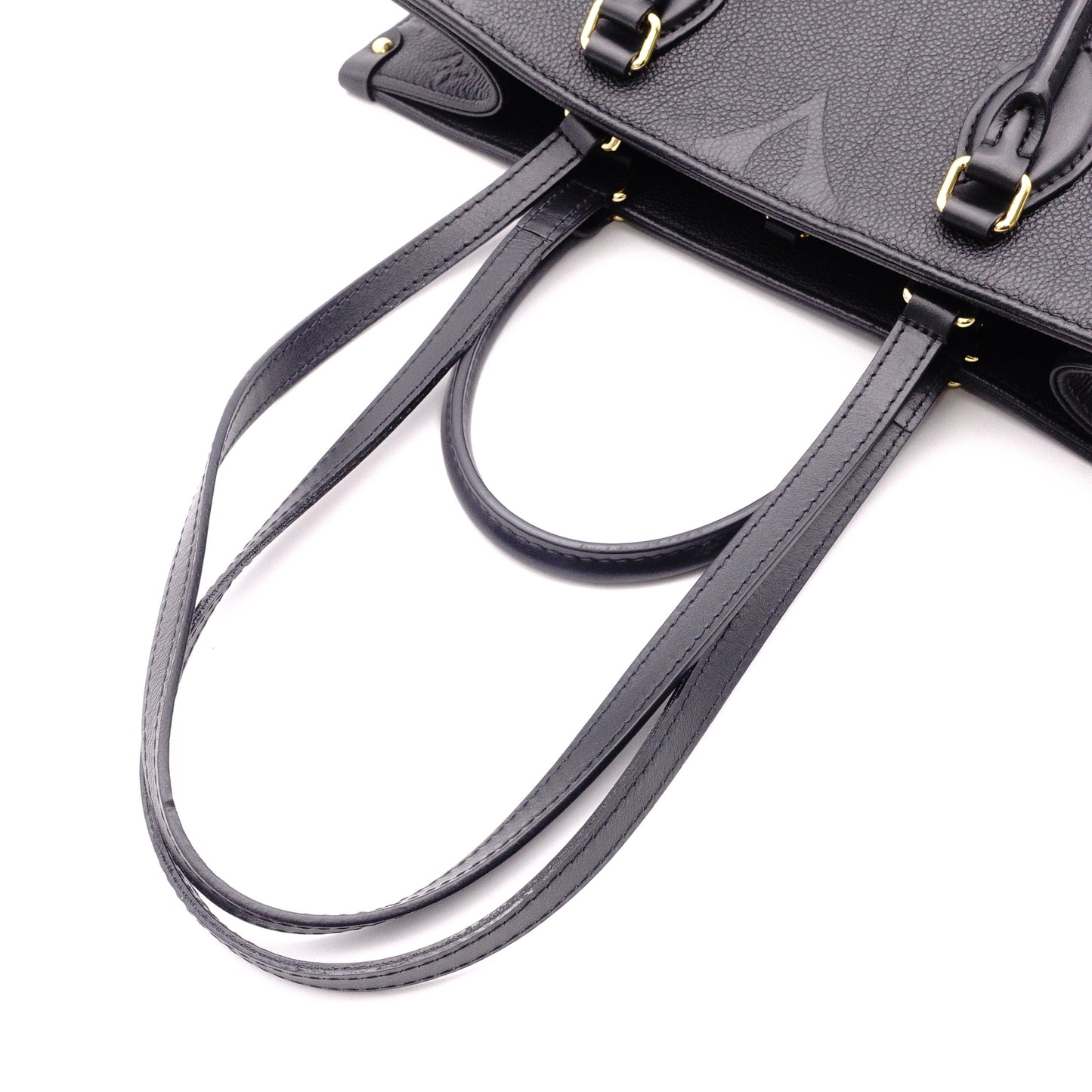 LOUIS VUITTON On the Go MM OTG Monogram Implant Handbag, Leather, Black, 2-Way