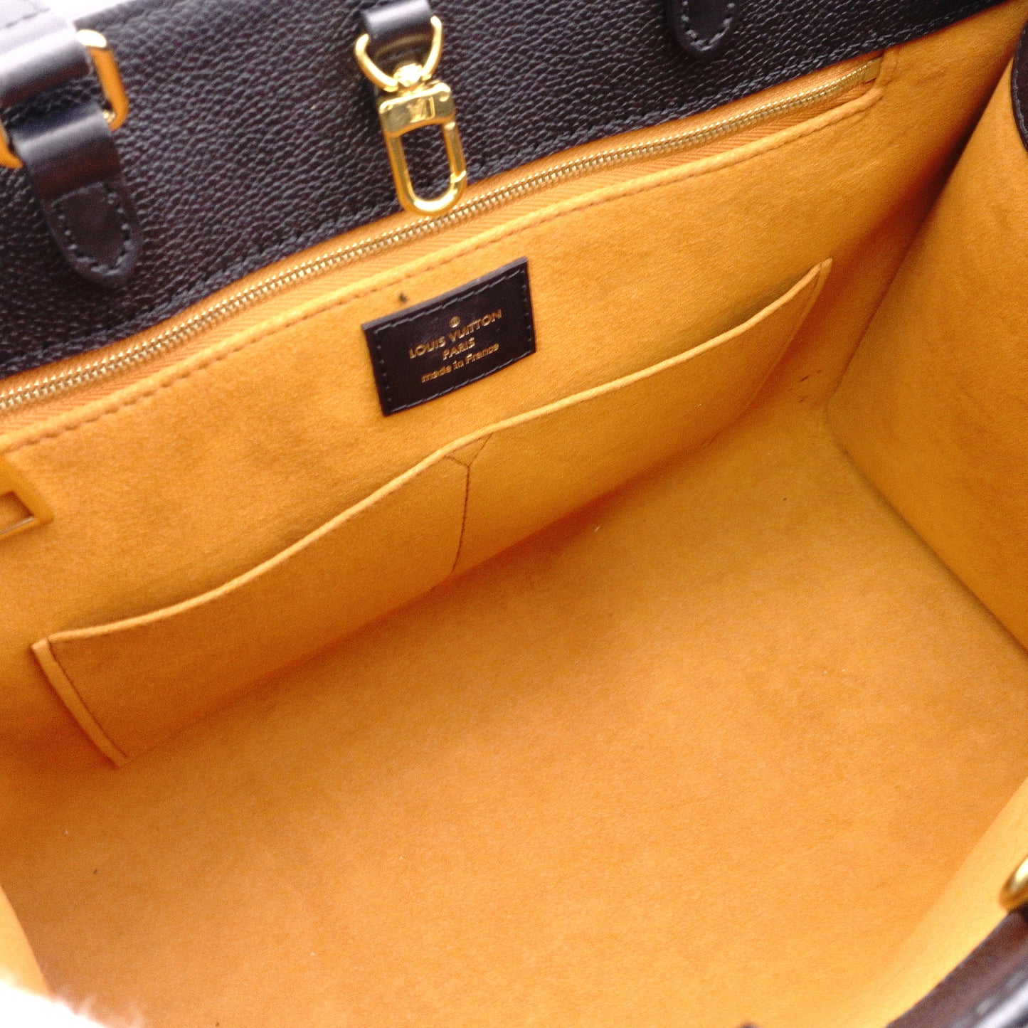 LOUIS VUITTON On the Go MM OTG Monogram Implant Handbag, Leather, Black, 2-Way