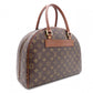 LOUIS VUITTON Norita Monogram Canvas Handbag with PVC Leather Accents in Brown Tones
