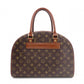 LOUIS VUITTON Norita Monogram Canvas Handbag with PVC Leather Accents in Brown Tones