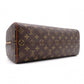 LOUIS VUITTON Norita Monogram Canvas Handbag with PVC Leather Accents in Brown Tones
