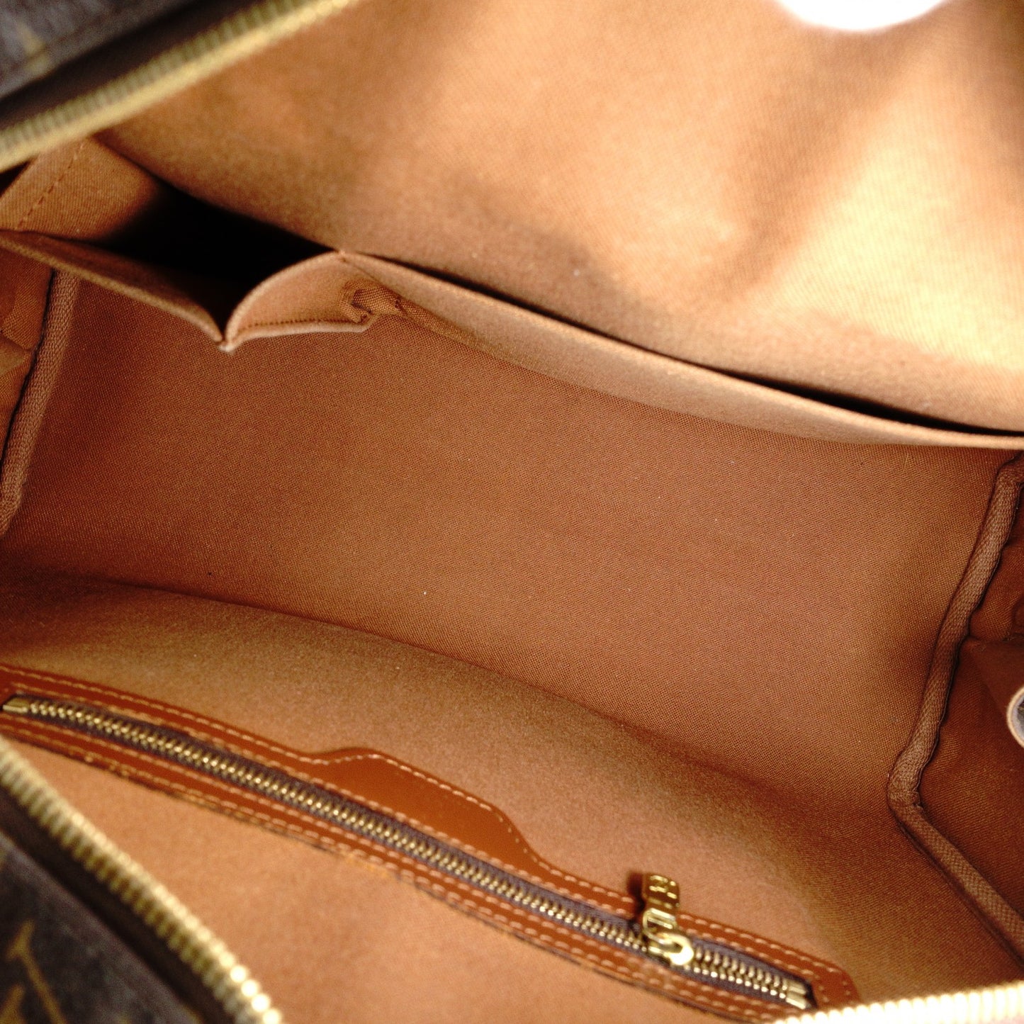 LOUIS VUITTON Norita Monogram Canvas Handbag with PVC Leather Accents in Brown Tones