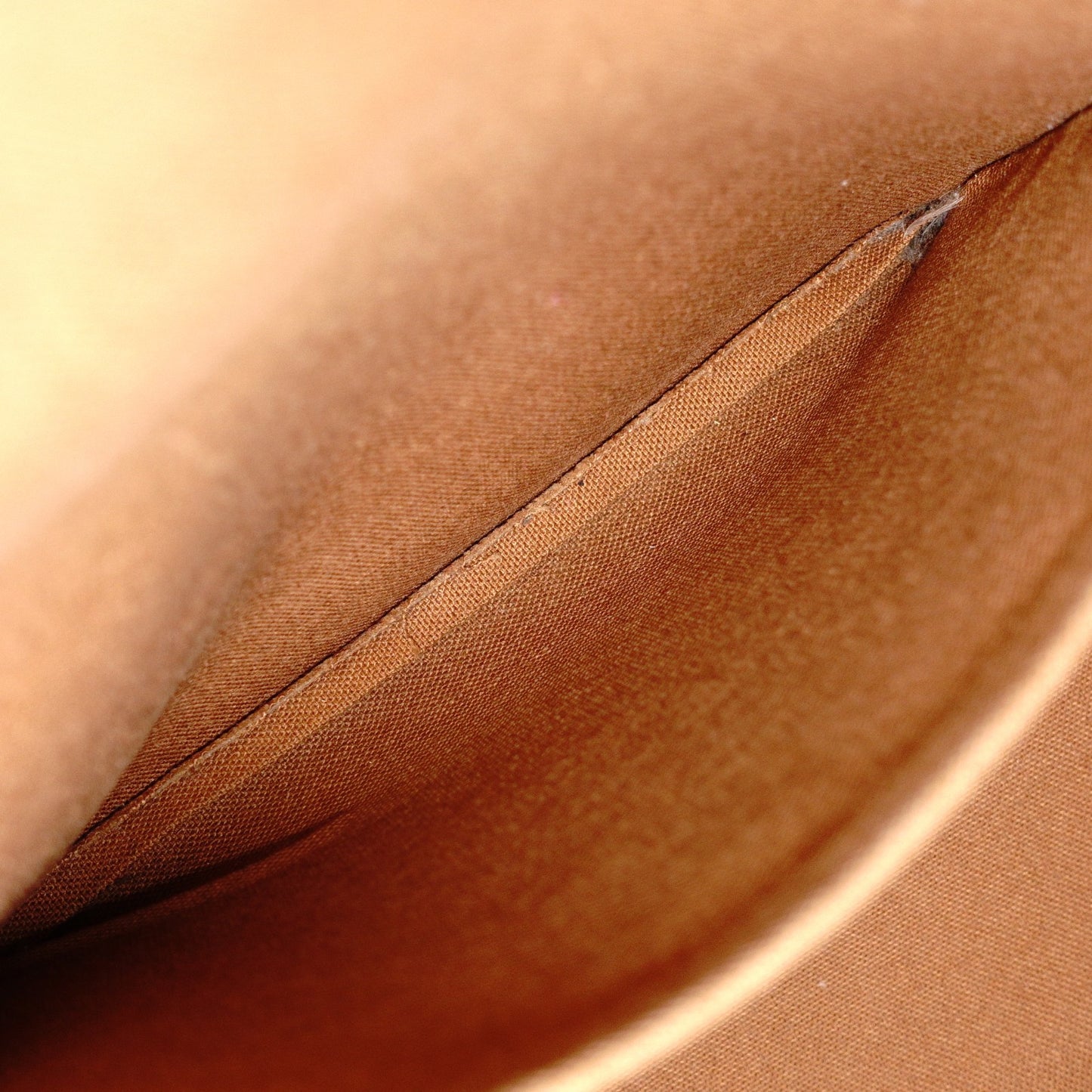 LOUIS VUITTON Norita Monogram Canvas Handbag with PVC Leather Accents in Brown Tones