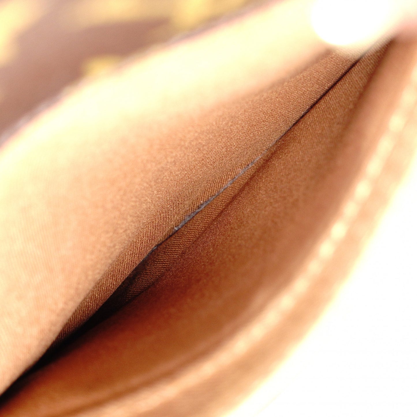 LOUIS VUITTON Norita Monogram Canvas Handbag with PVC Leather Accents in Brown Tones