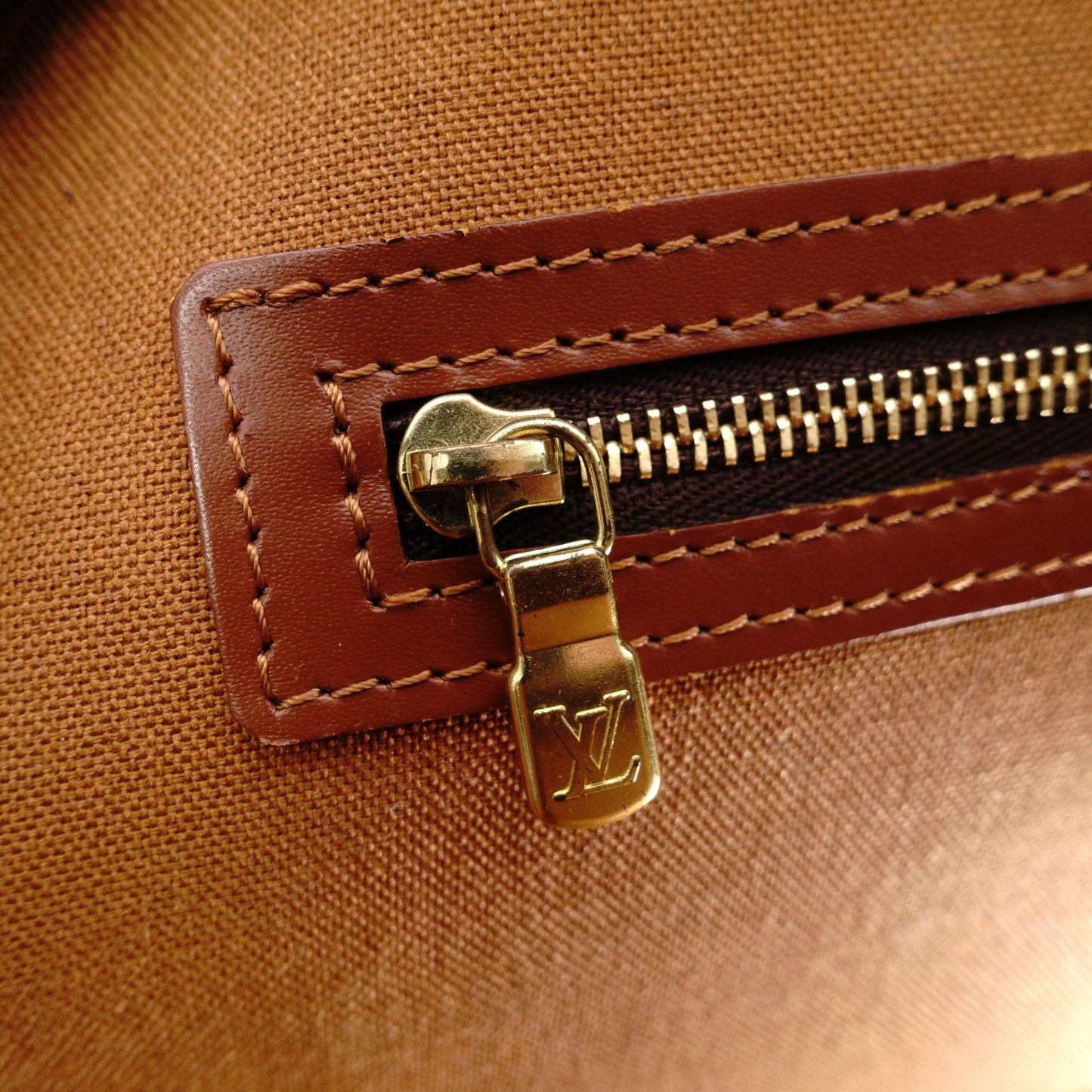 LOUIS VUITTON Norita Monogram Canvas Handbag with PVC Leather Accents in Brown Tones