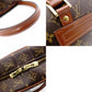 LOUIS VUITTON Norita Monogram Canvas Handbag with PVC Leather Accents in Brown Tones