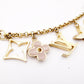 LOUIS VUITTON Charm, Metal and Plastic, Gold, Bag Charm