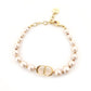 DIOR 30 Montaigne Fake Pearl Bracelet with CD Logo Pink Gold Hardware Bangle 7-10-480