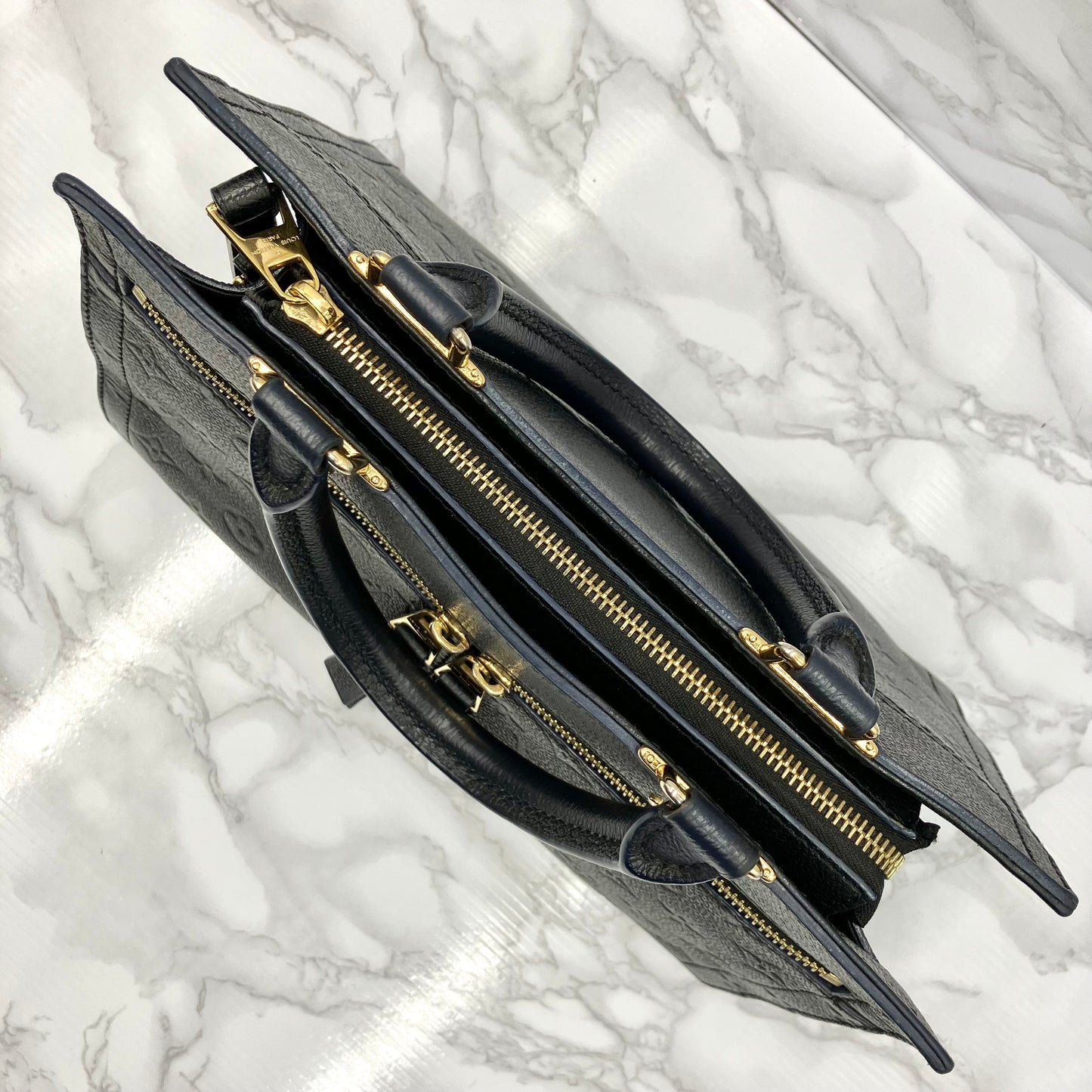 LOUIS VUITTON Three PM Empreinte