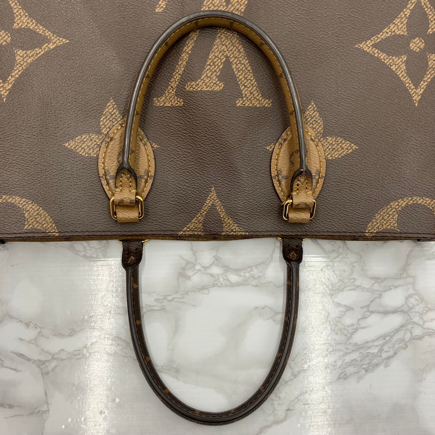 LOUIS VUITTON Monogram Reverse Giant On The Go MM
