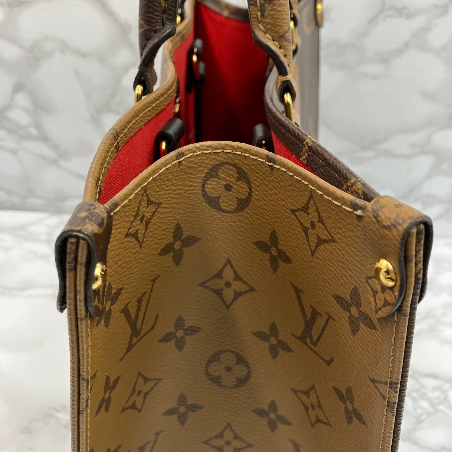LOUIS VUITTON Monogram Reverse Giant On The Go MM