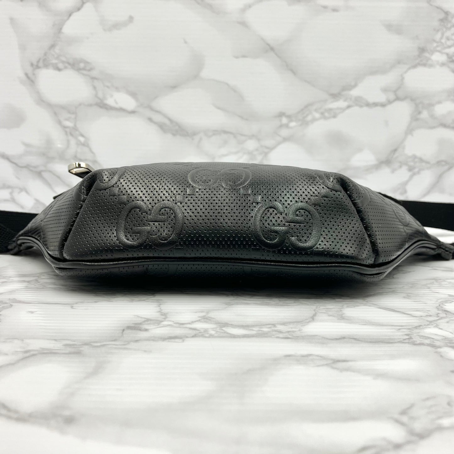 GUCCI GG Embossed body bag