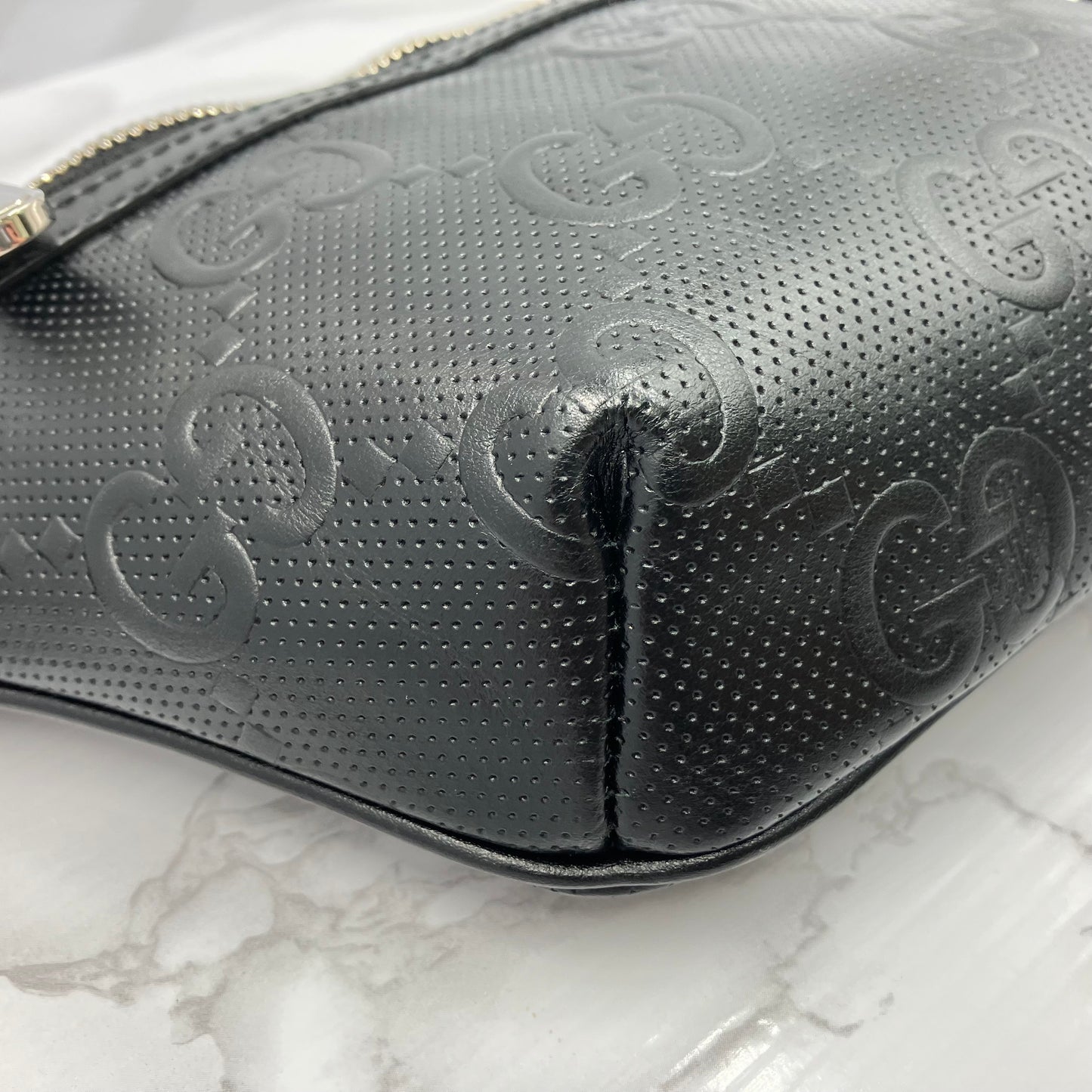 GUCCI GG Embossed body bag