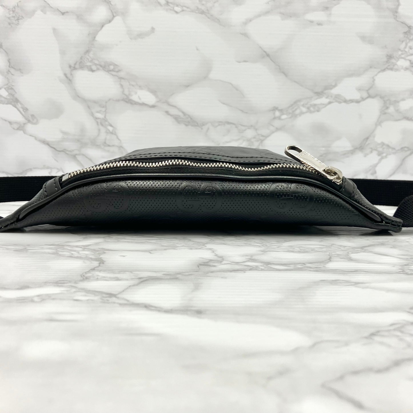 GUCCI GG Embossed body bag