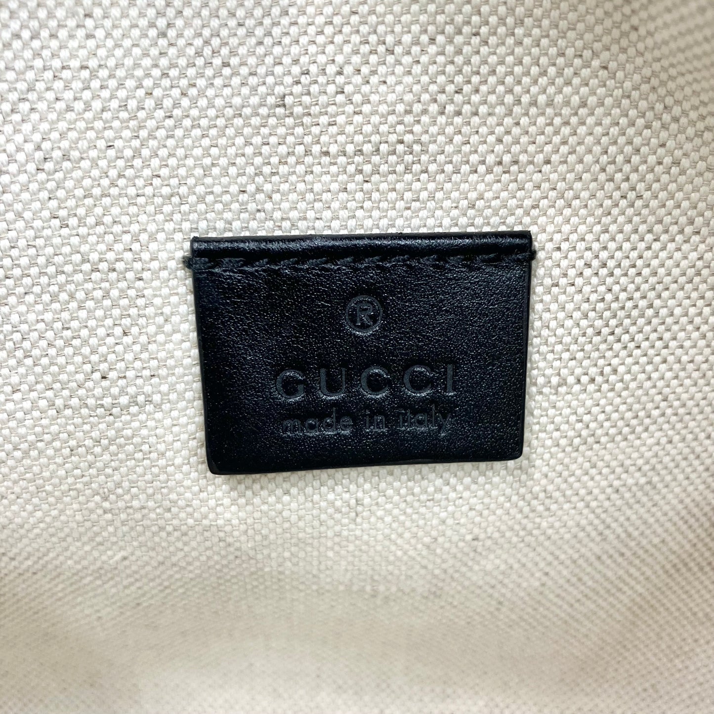 GUCCI GG Embossed body bag