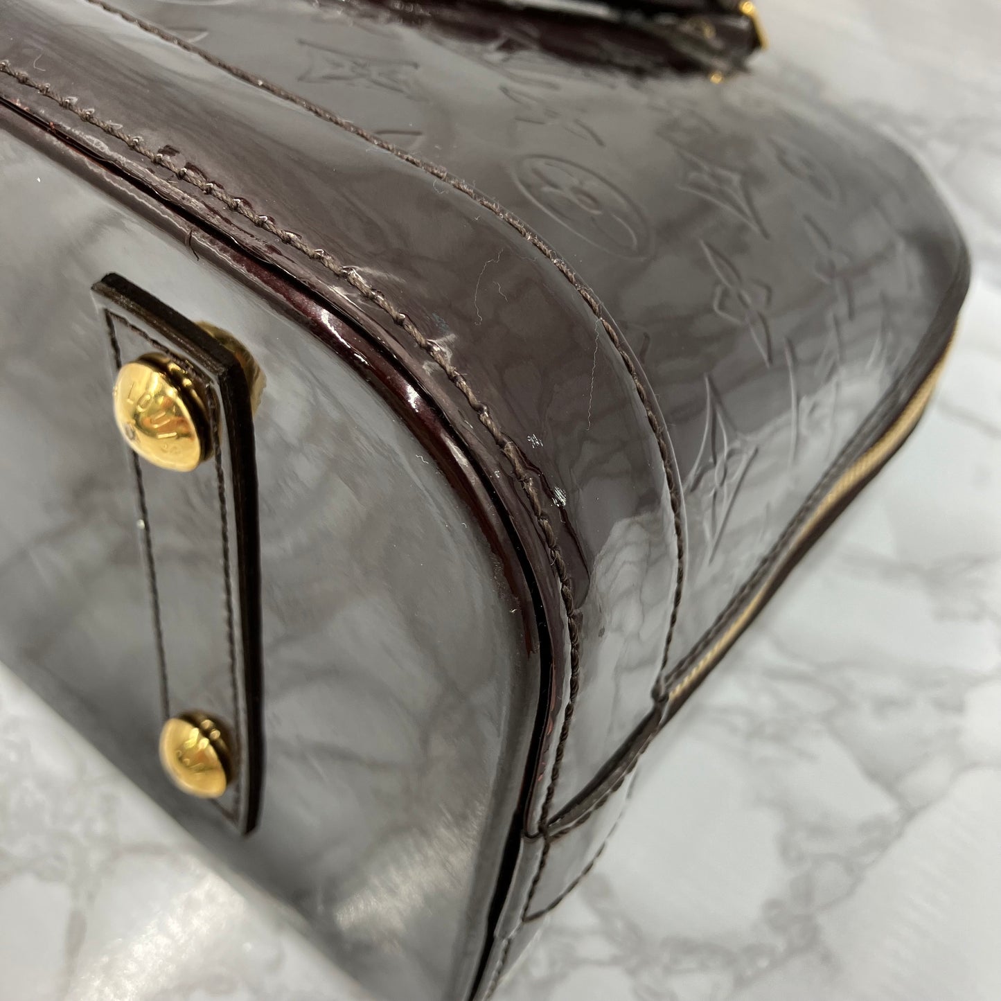 LOUIS VUITTON Vernis Alma PM