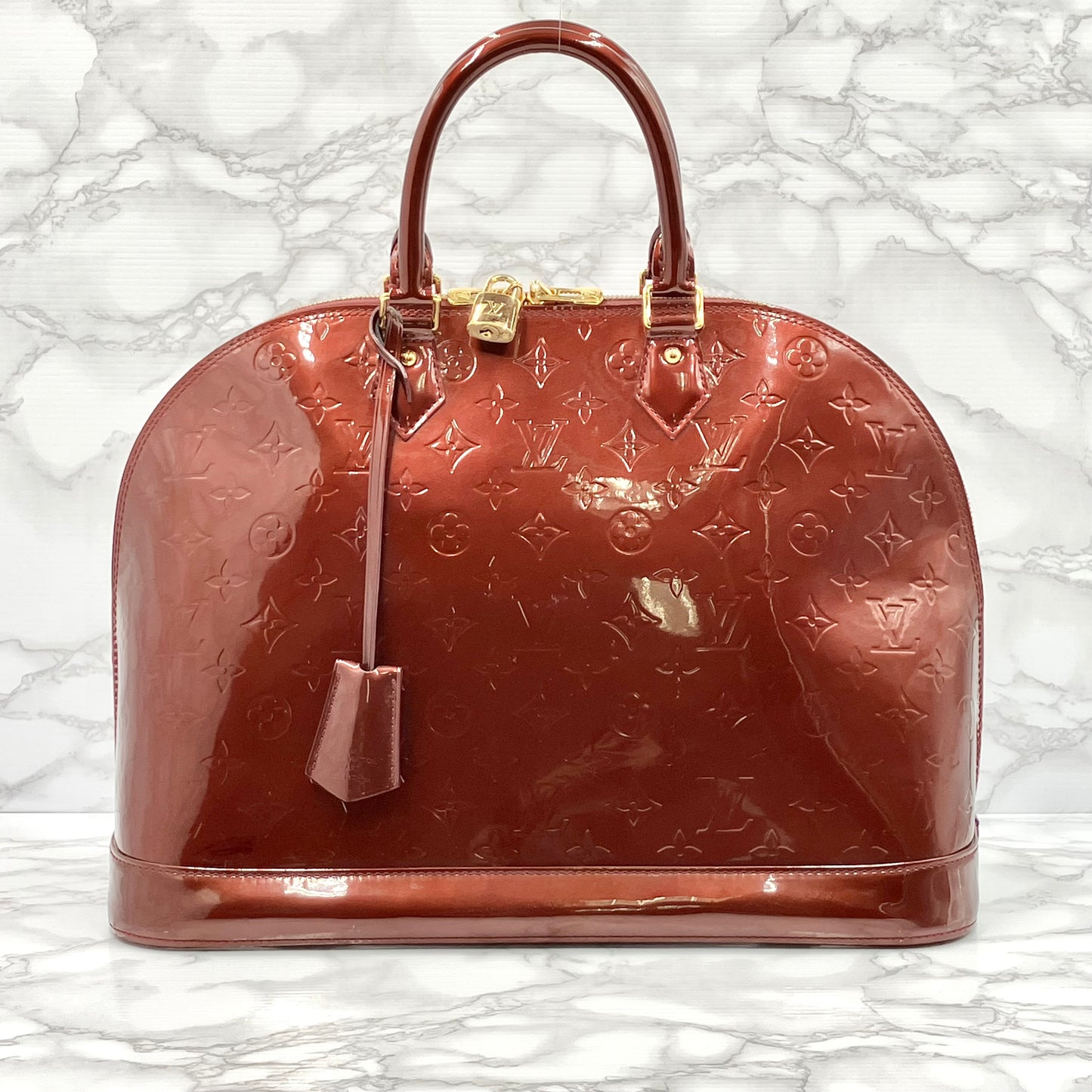 LOUIS VUITTON Vernis Alma MM