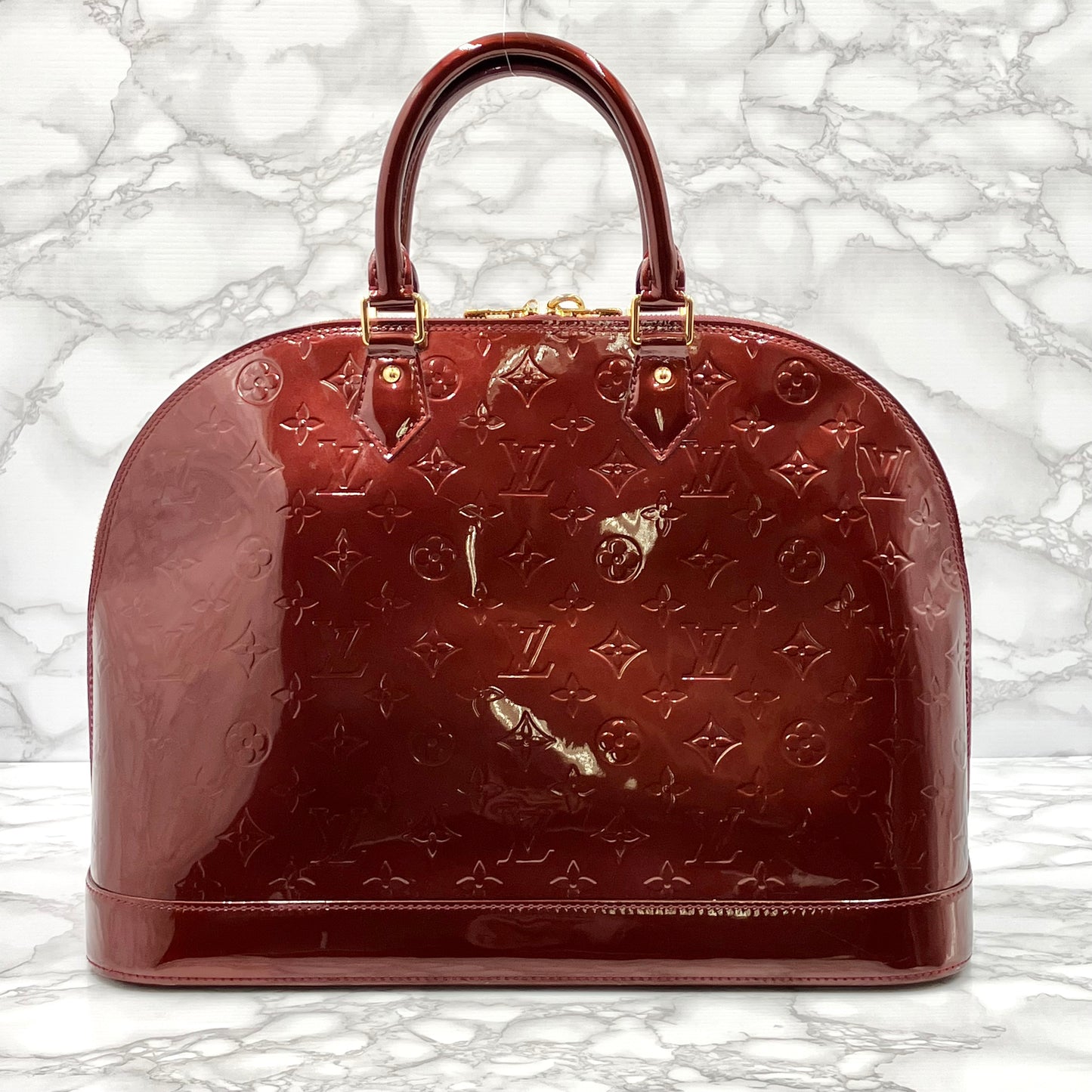 LOUIS VUITTON Vernis Alma MM