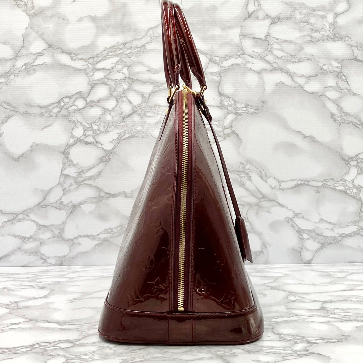 LOUIS VUITTON Vernis Alma MM