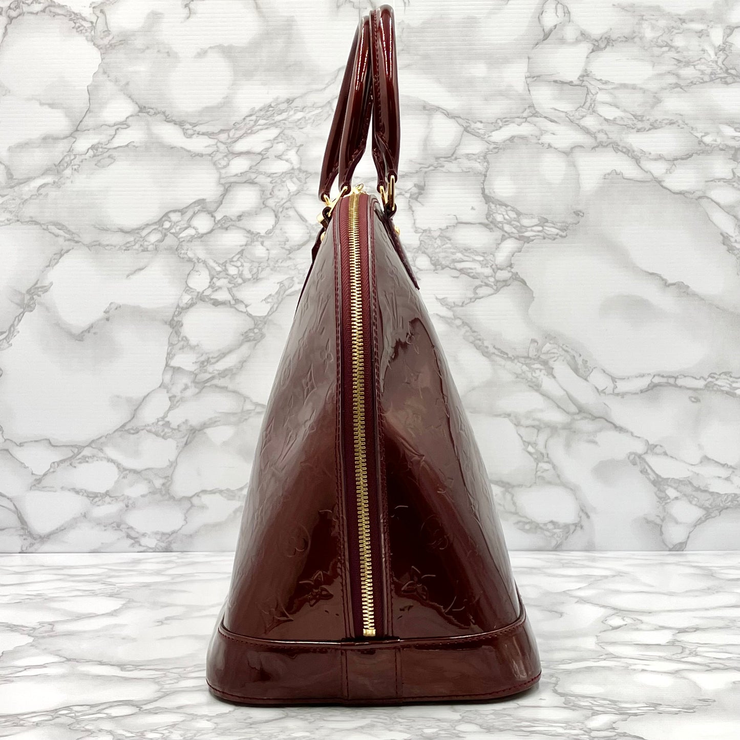 LOUIS VUITTON Vernis Alma MM