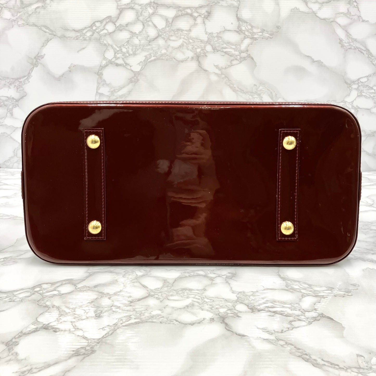 LOUIS VUITTON Vernis Alma MM