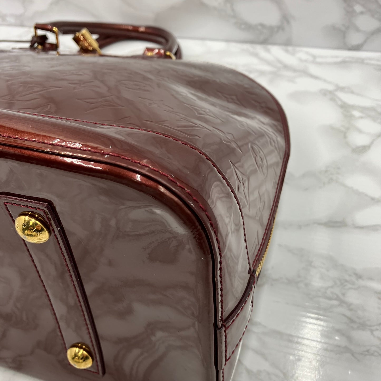 LOUIS VUITTON Vernis Alma MM