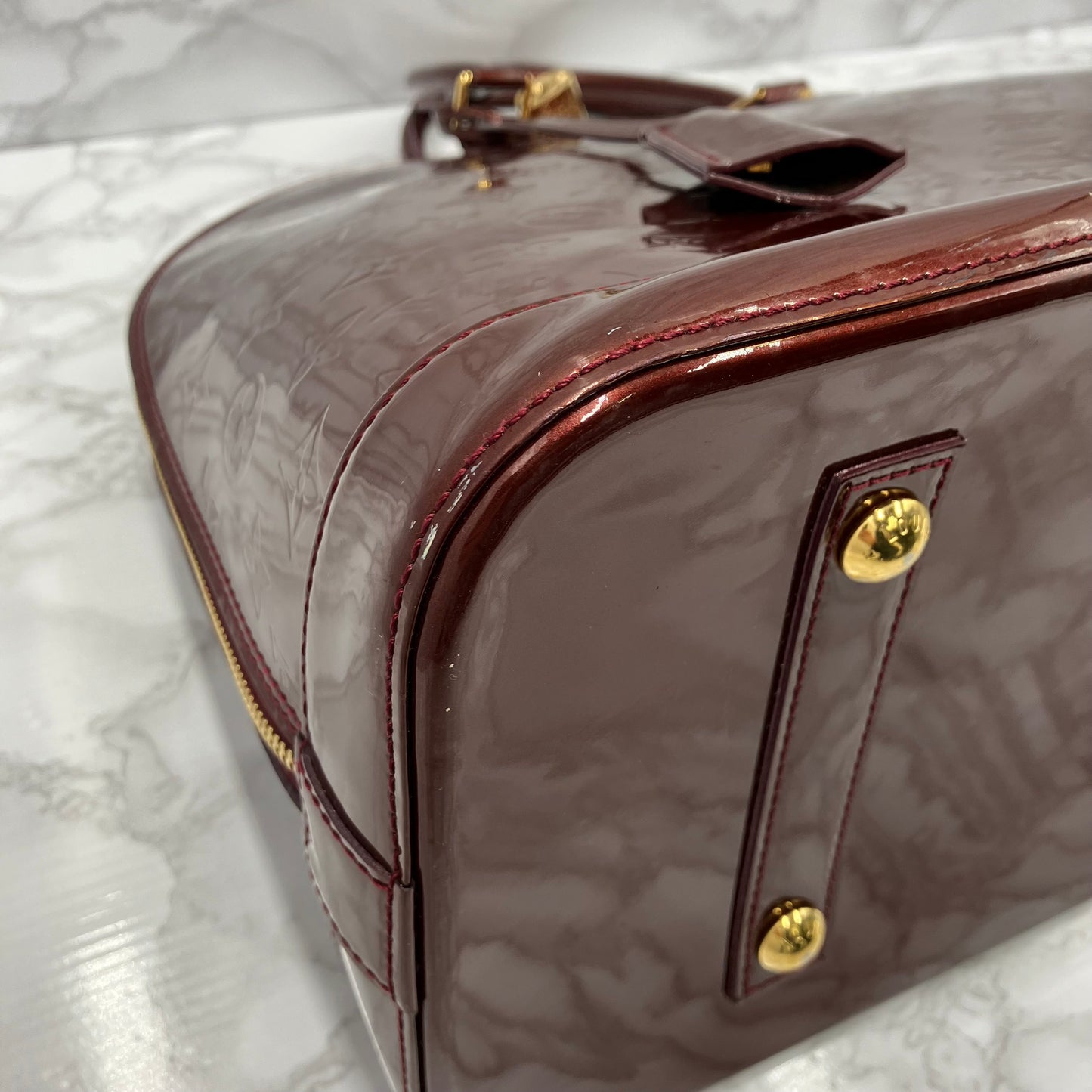 LOUIS VUITTON Vernis Alma MM