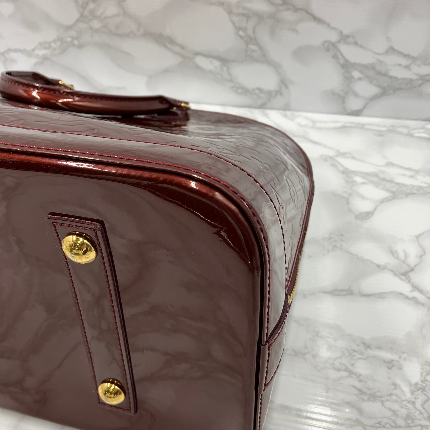 LOUIS VUITTON Vernis Alma MM