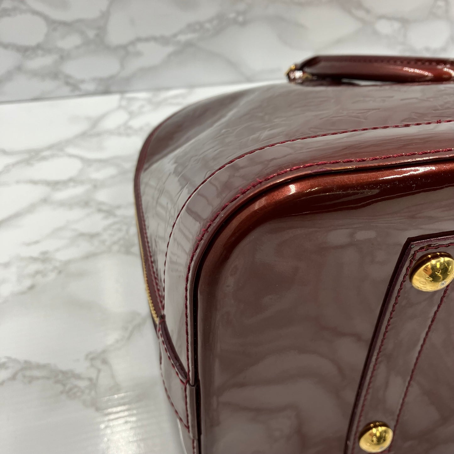 LOUIS VUITTON Vernis Alma MM