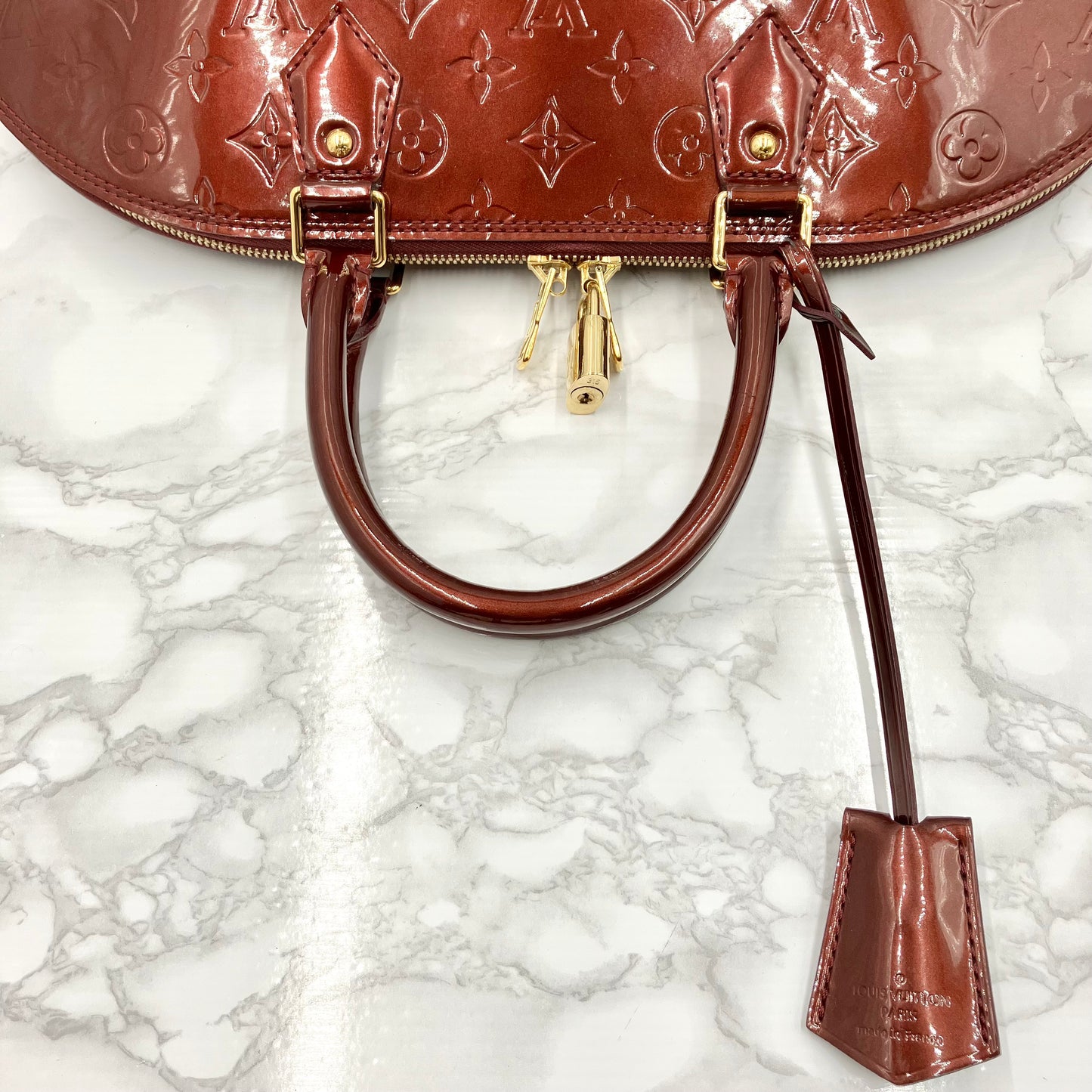 LOUIS VUITTON Vernis Alma MM