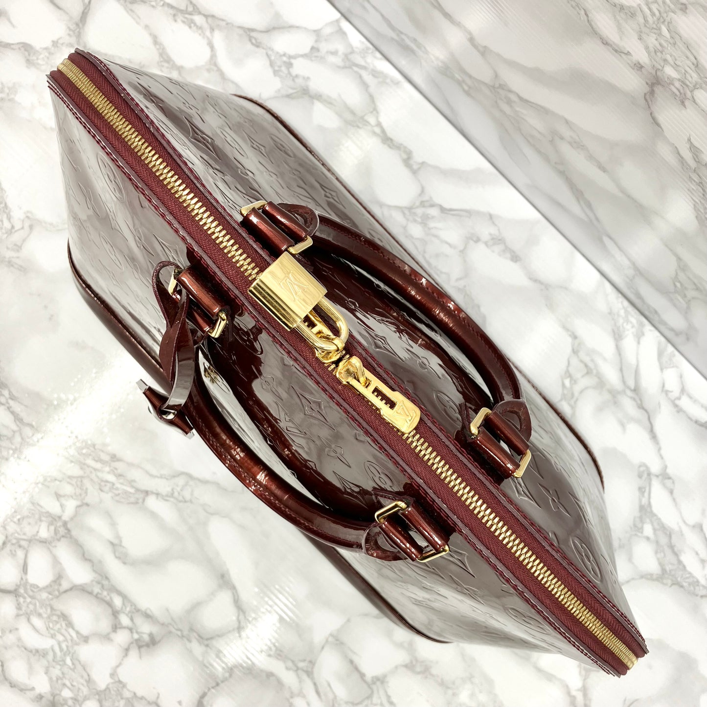 LOUIS VUITTON Vernis Alma MM