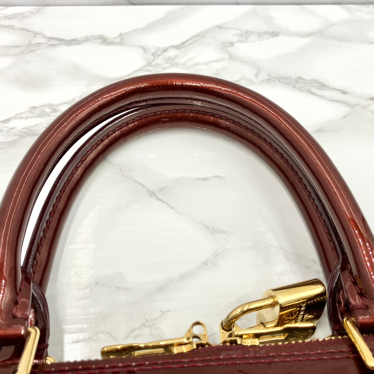 LOUIS VUITTON Vernis Alma MM