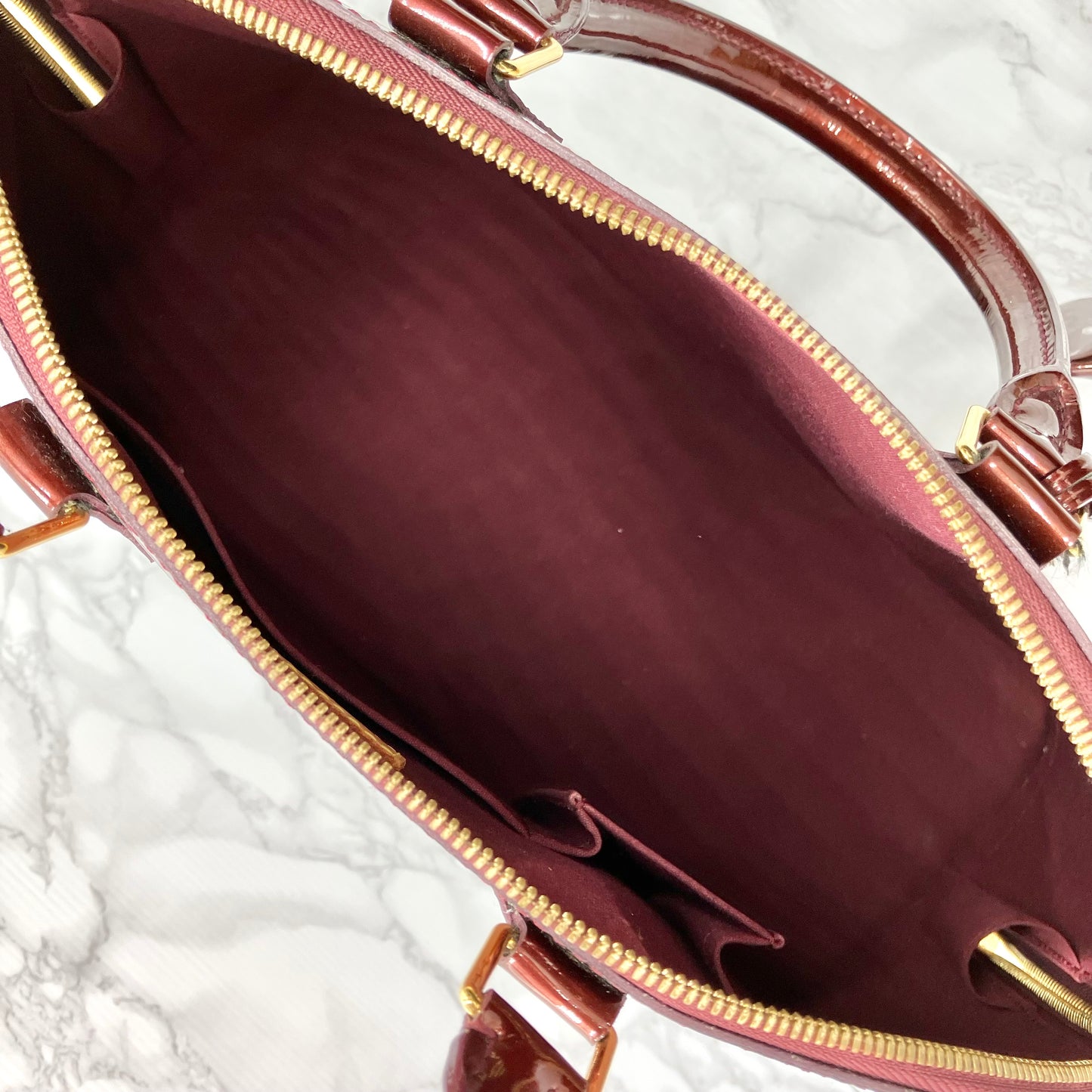 LOUIS VUITTON Vernis Alma MM