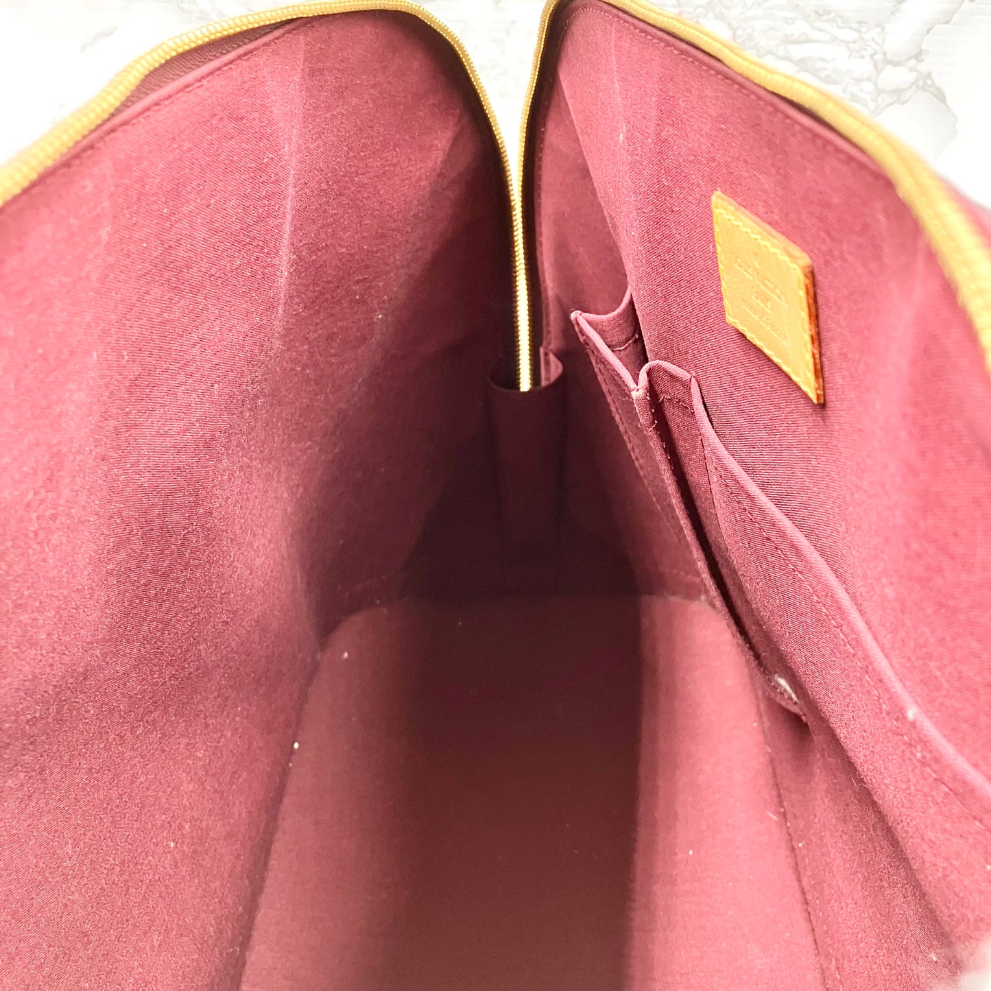 LOUIS VUITTON Vernis Alma MM