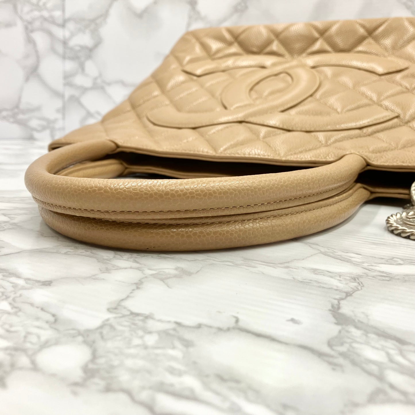 CHANEL Caviar skin medallion