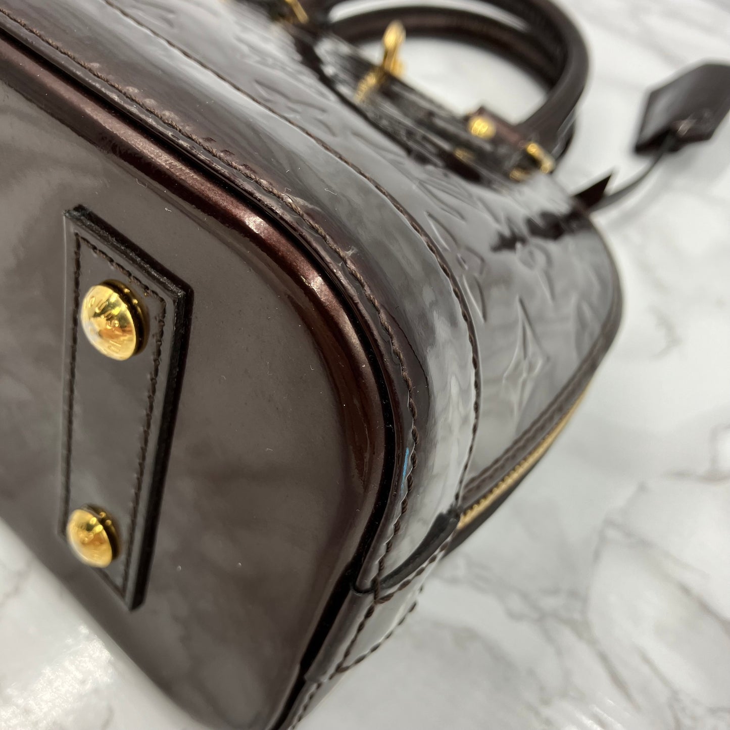 LOUIS VUITTON Alma BB vernis