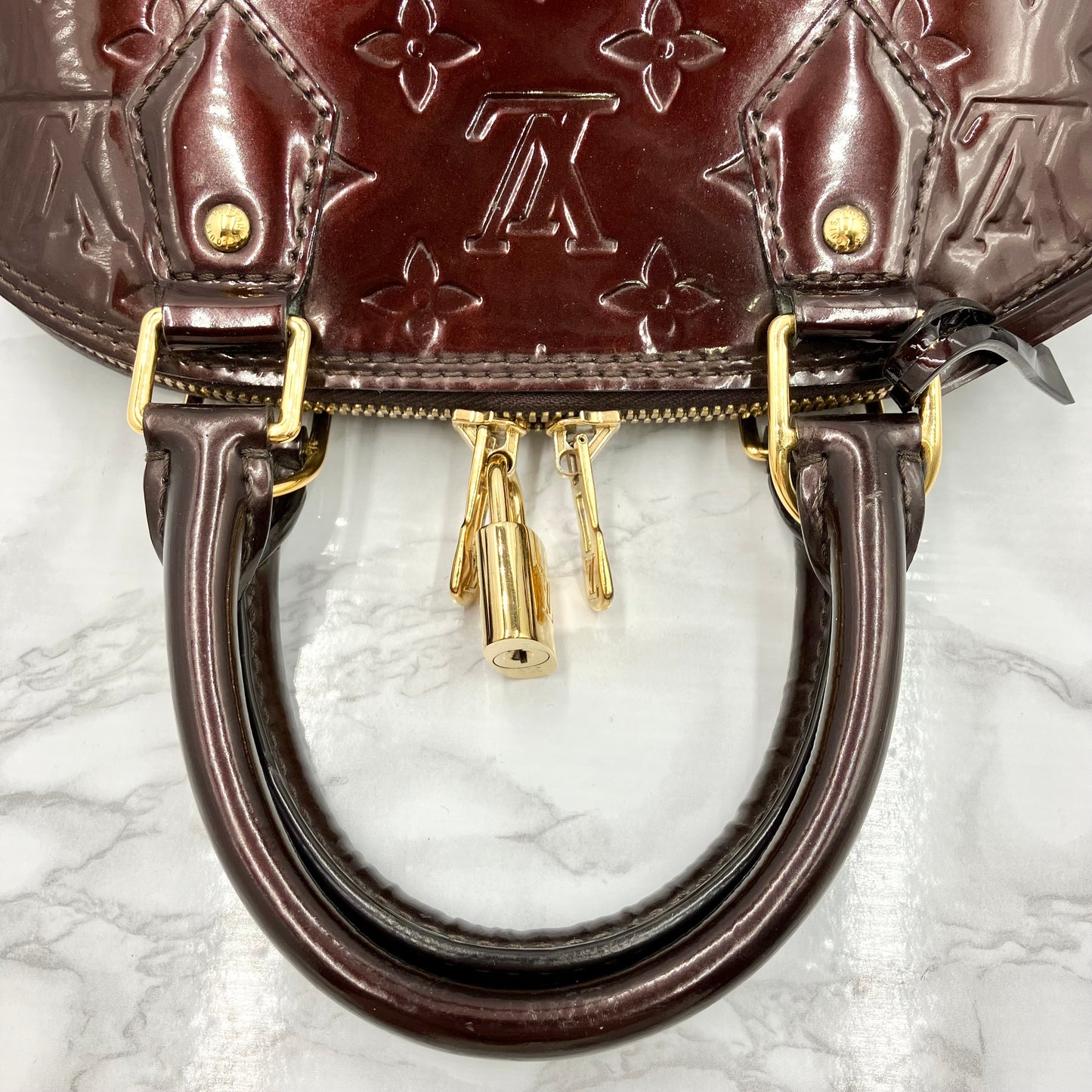 LOUIS VUITTON Alma BB vernis