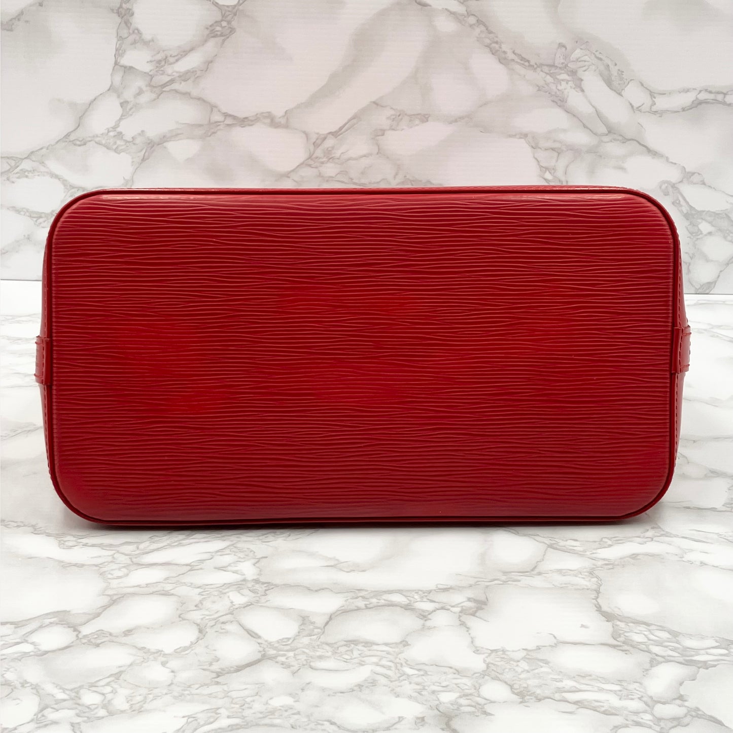 LOUIS VUITTON Epi Alma PM Handbag
